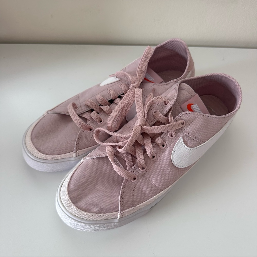 Nike Women’s Light Pink Canvas Low-Top Sneakers with White Swoosh